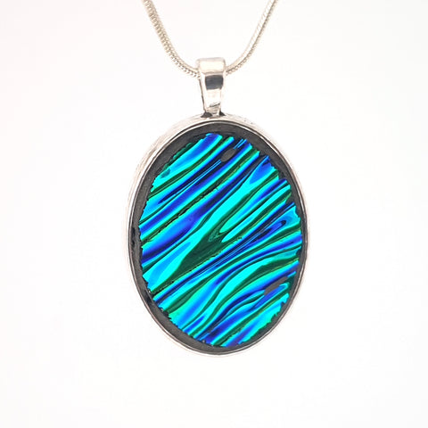 Blue textured dichroic oval glass pendant