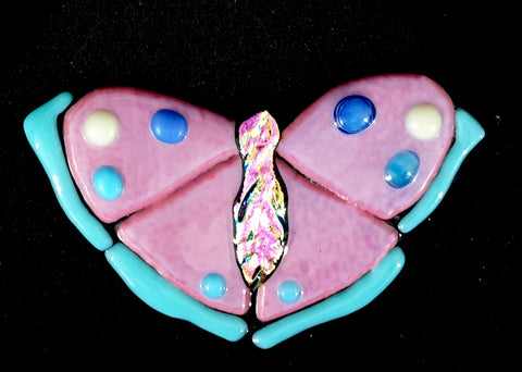Pink and blue butterfly with silvery pink dichroic body