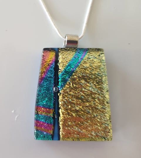 Gold dichroic glass with aqua and pink on a 44cm chain