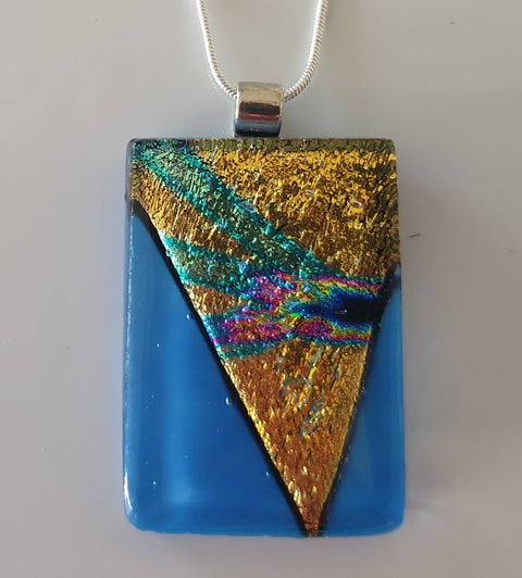 stunning gold dichroic with aqua on mid blue glass