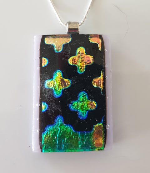 Black dichroic with gold and green detail