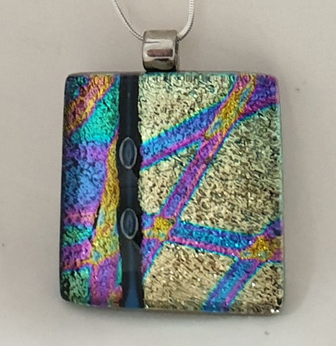 Reflecting silver and gold multicoloured pendant with two encased bubbles
