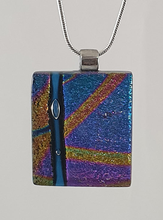 Stunning blue dichroic with multi coloured design