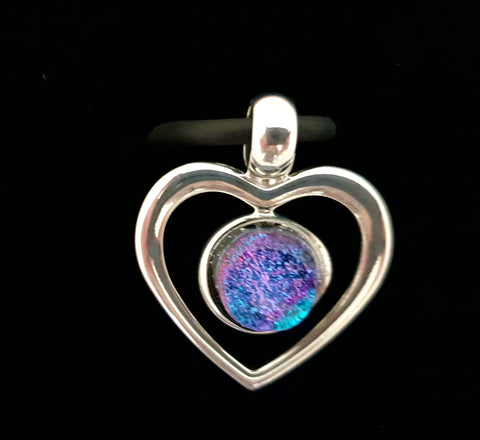 Stunning silver plated heart shaped pendant with dichroic cabochon