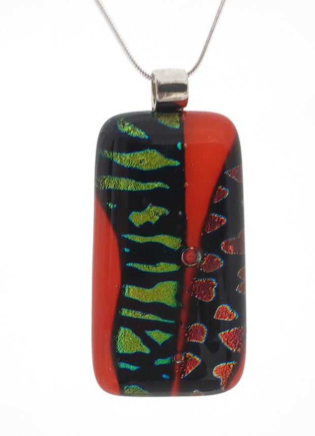 long red pendant with red hearts and green pattern