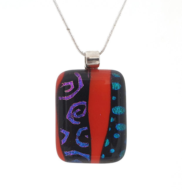 stunning red dichroic with purple and blue patterns
