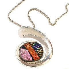 Stunning dichroic pendant in silver plated setting