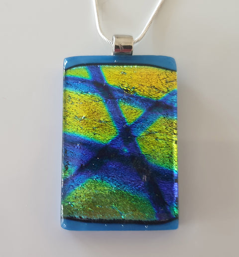 shimmering blue stripes on gold dichroic 4.5 cm by 3.5 cm on a 44cm chain